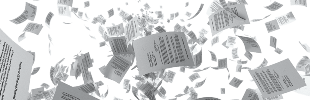 A Young Boy Amidst The Din And Papers Of The&nbsp;World